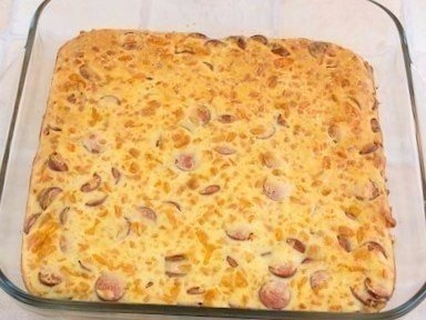 Фото к рецепту: Пирог с сыром и сосисками Фото к рецепту: Пирог с сыром и сосисками