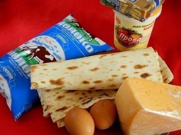 Фото к рецепту: Пирог из лаваша с сыром Фото к рецепту: Пирог из лаваша с сыром